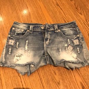 Grace in LA Jean shorts with decals